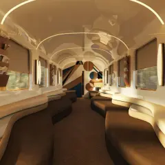 Luxuriöser Zugwaggon mit geschwungenen Sofas und stilvoller Wandkunst. Perfekt für eine entspannte Fahrt nach Rom.