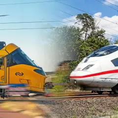 Zwei Züge, ein gelb-blauer und ein weißer ICE, rasen auf parallelen Gleisen. Die Reise von Düsseldorf nach Amsterdam wird durch diese schnellen Verbindungen ermöglicht.