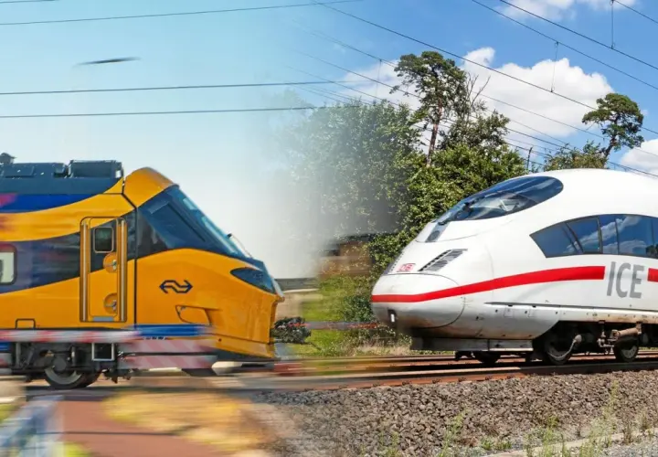Zwei Züge, ein gelb-blauer und ein weißer ICE, rasen auf parallelen Gleisen. Die Reise von Düsseldorf nach Amsterdam wird durch diese schnellen Verbindungen ermöglicht.