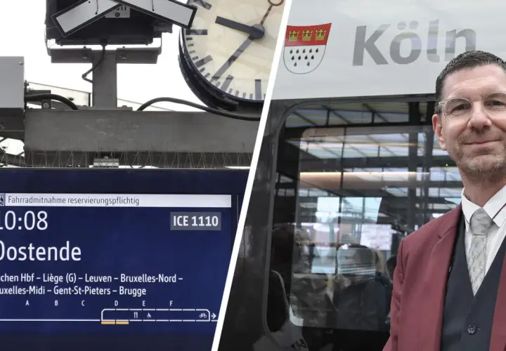 ICE-Zug von Köln nach Aachen und weiter nach Frankfurt. Ein Zugbegleiter lächelt vor dem ICE.