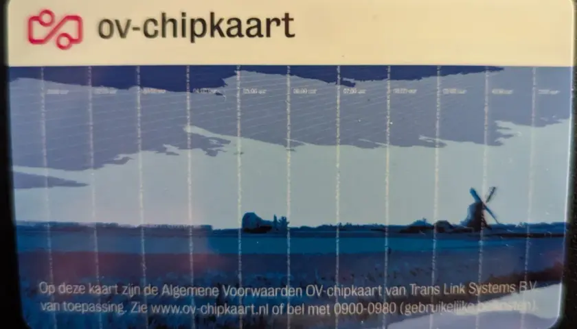 OV-chipkaart met molenlandschap. Deze kaart is geldig voor het openbaar vervoer in Nederland.